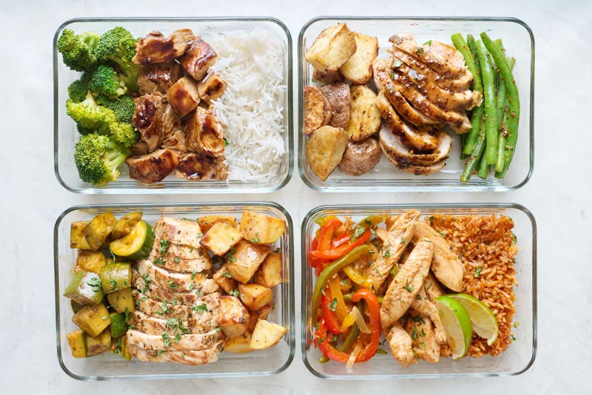 Four chicken meal prep recipes in glass storage containers: chicken teriyaki, chicken fajita, honey mustard chicken, and lemon garlic chicken.
