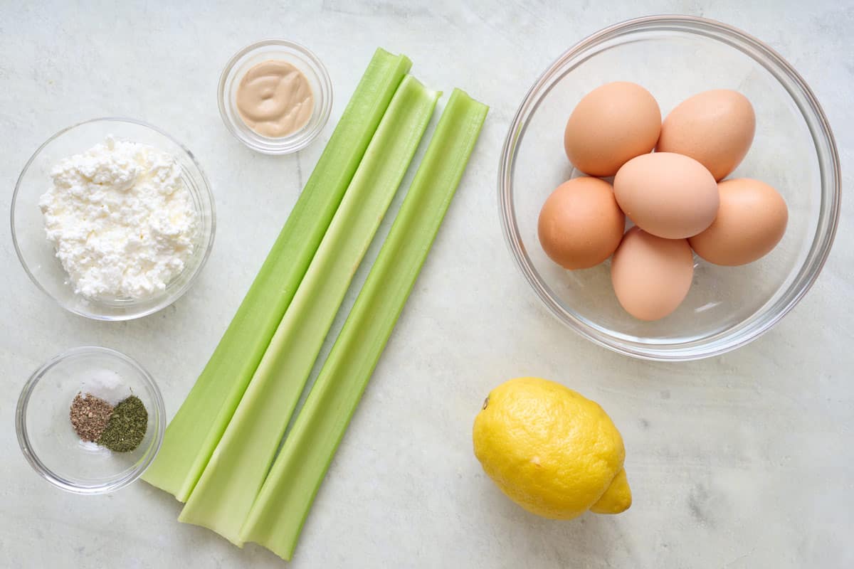 Ingredients for recipe: cottage cheese, eggs, dijon mustard, celery, seasonings, and lemon.