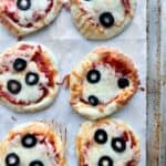 Mini pizzas made with homemade Greek yogurt pizza dough.