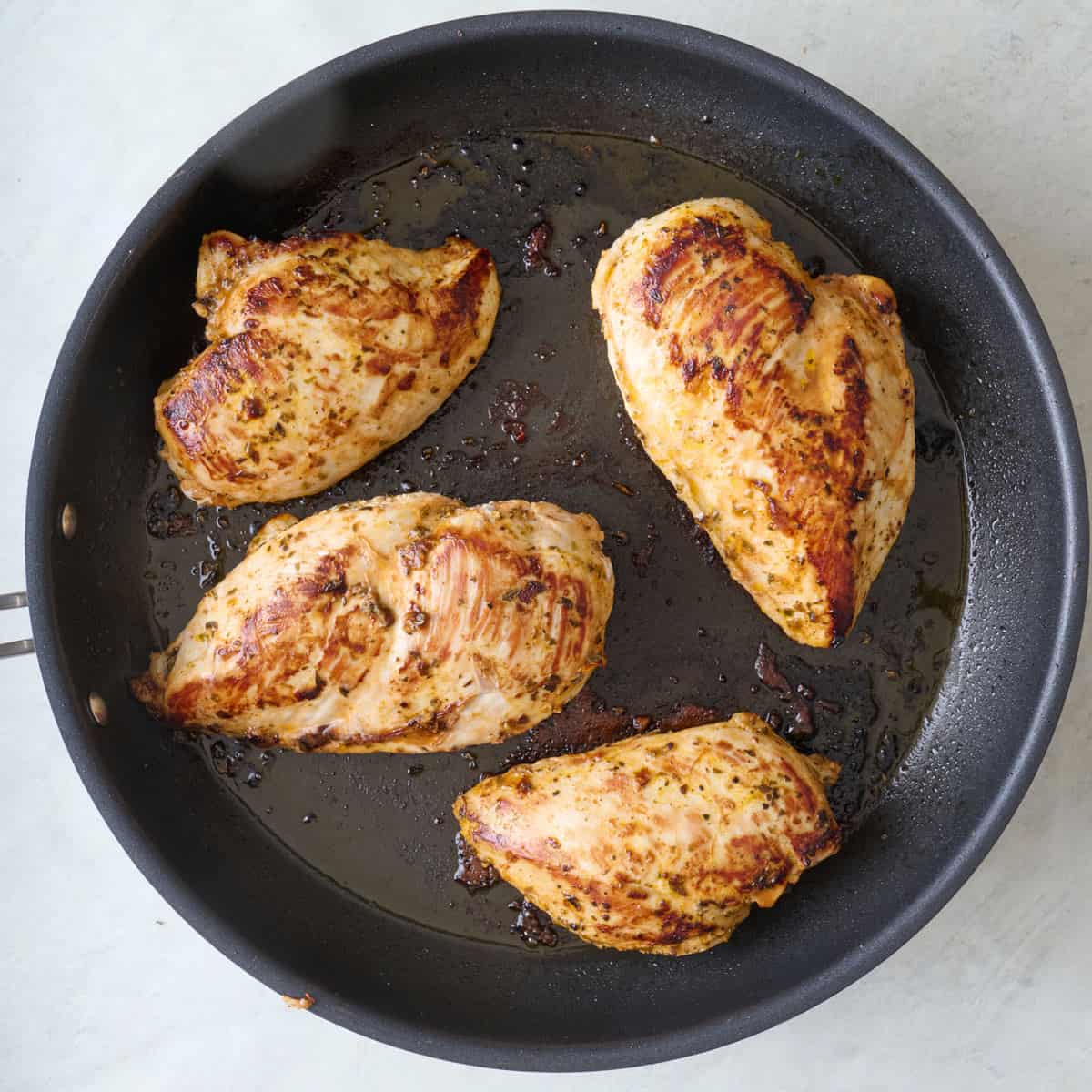 After cooking in a skillet and flipped to show cooked side.