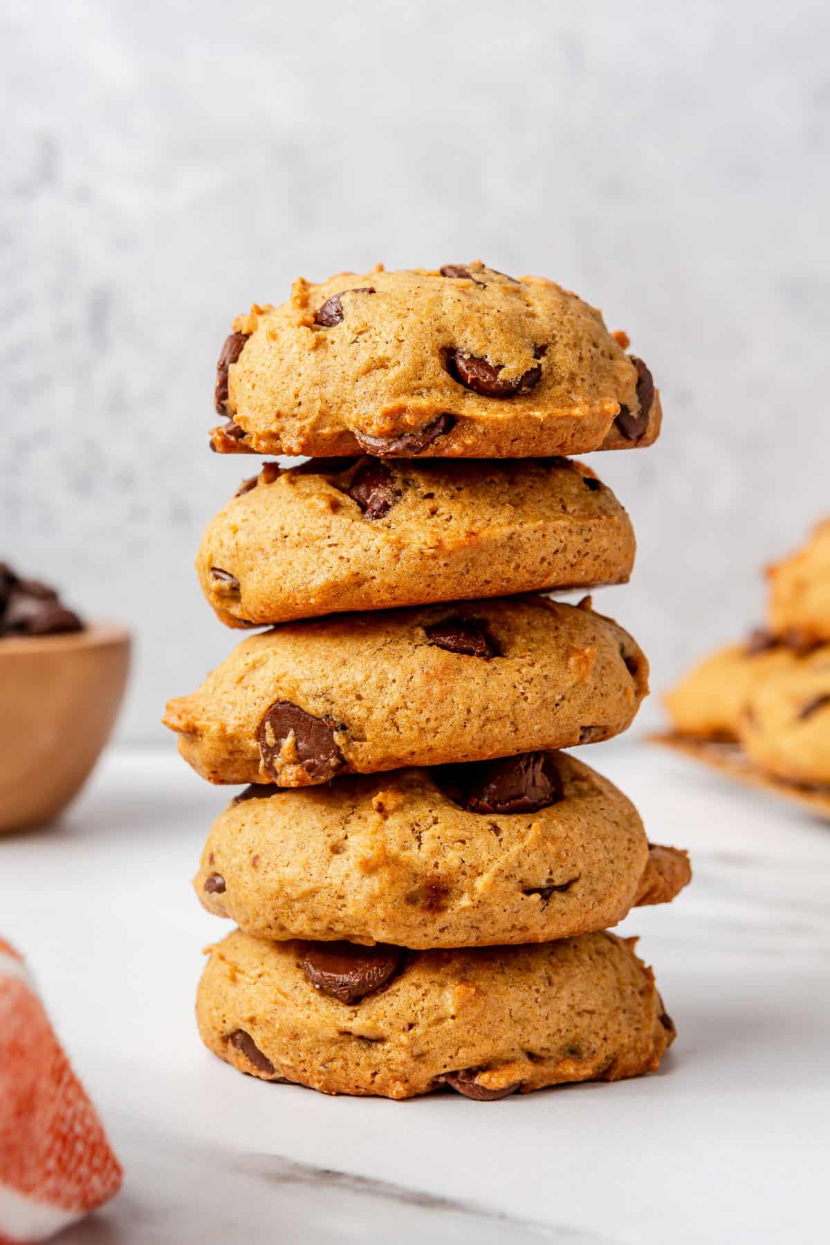 Stack of pumpkin chocolate chip cookies.