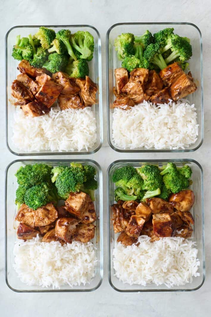 Teriyaki chicken meal prep containers with rice and broccoli.