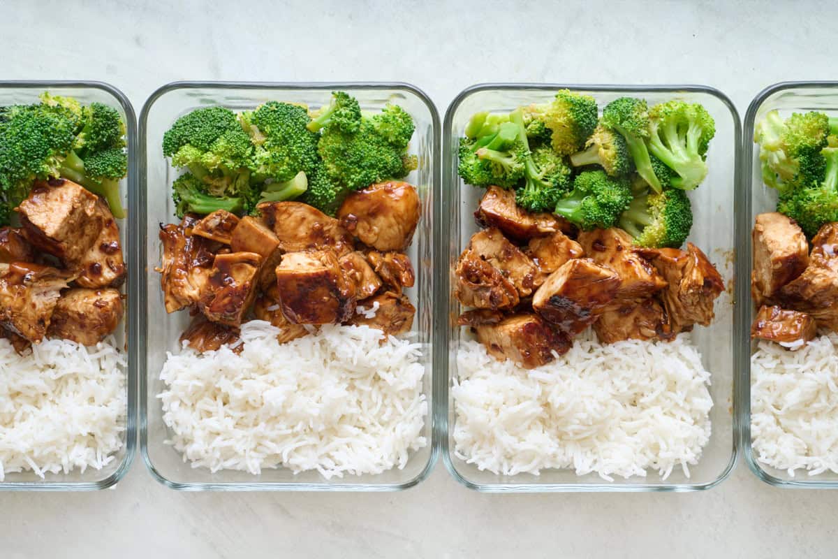 Teriyaki chicken meal prep containers with rice and broccoli.