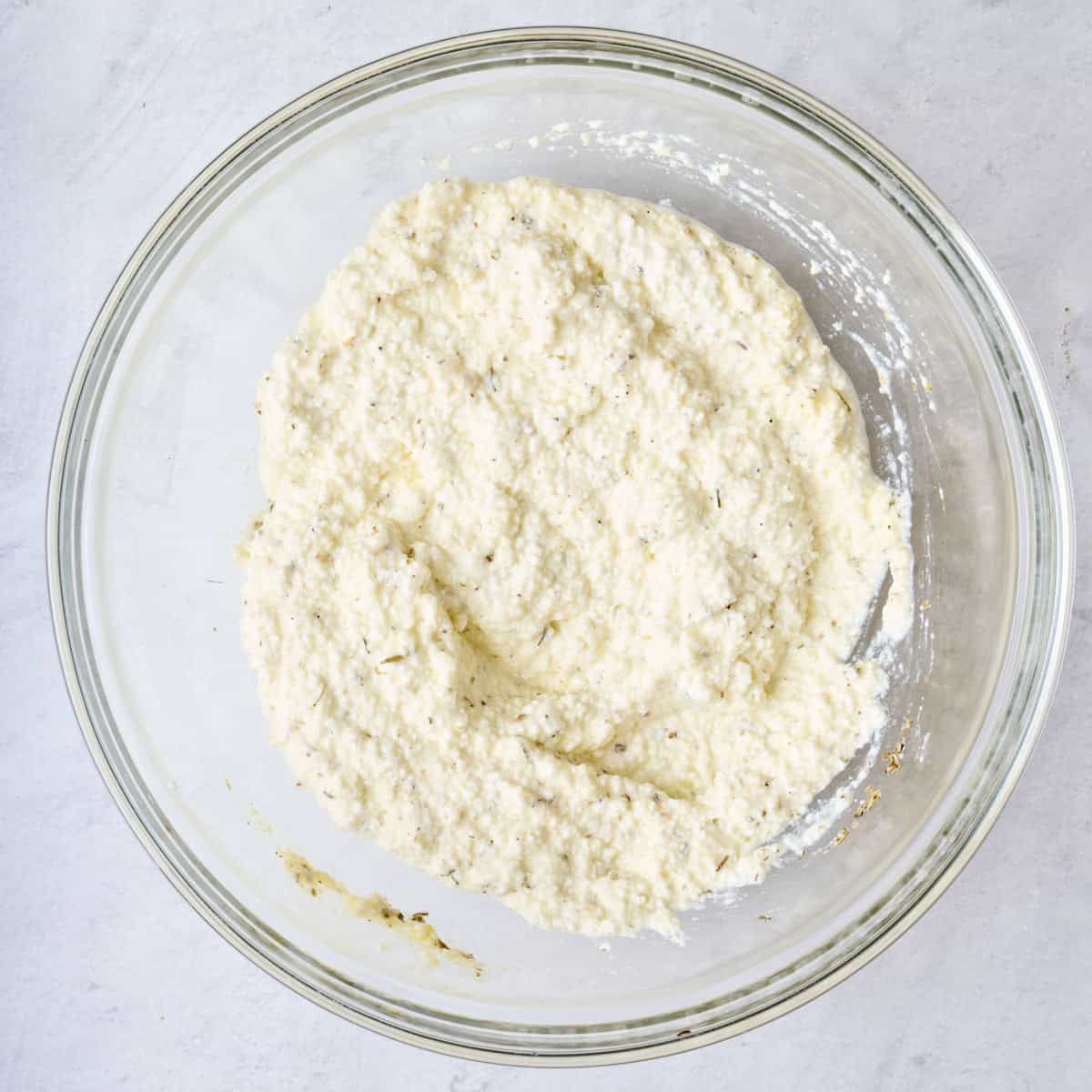 Ricotta mixture in a bowl after mixing.