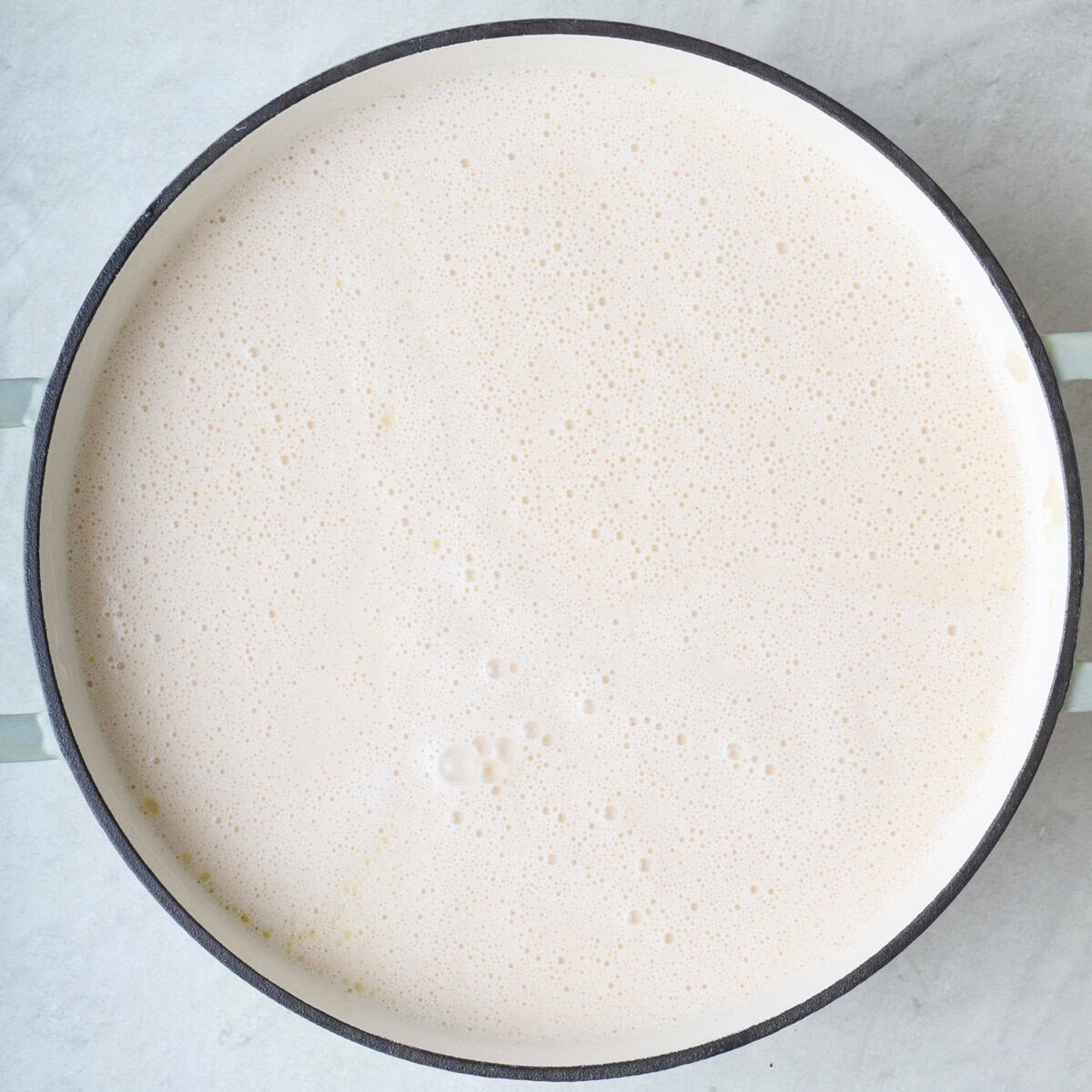 Broth after blending with beans and sour cream into a creamy sauce.