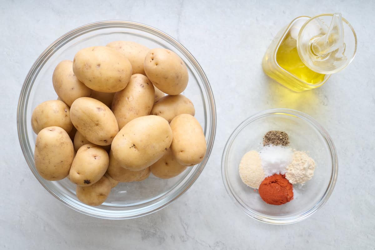 Ingredients for recipe: baby potatoes, oil, and spices.