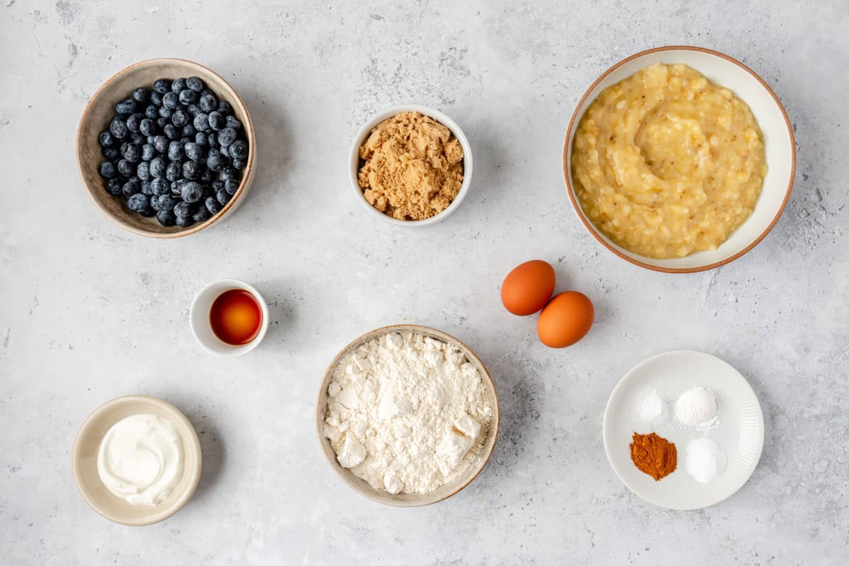 Ingredients for recipe: fresh blueberries, brown sugar, vanilla, yogurt, eggs, flour, mashed bananas, spices and rising agents.