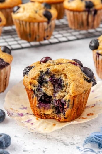 Blueberry banana muffin with a bite taken out.