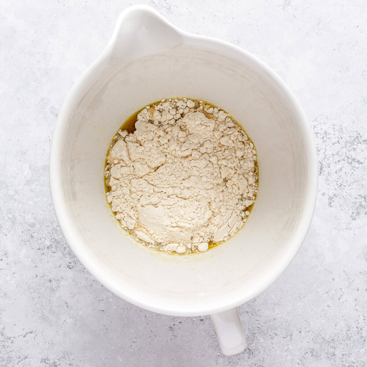 Yeast mixture after mixed with some flour added.