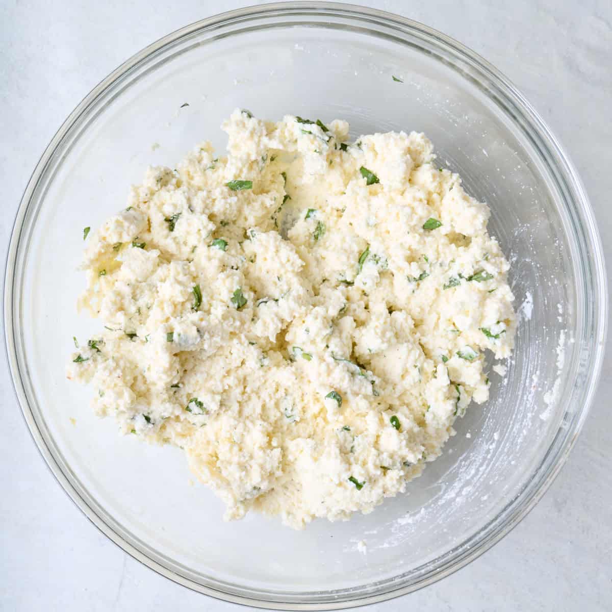 Ricotta mixture in a bowl after mixing.