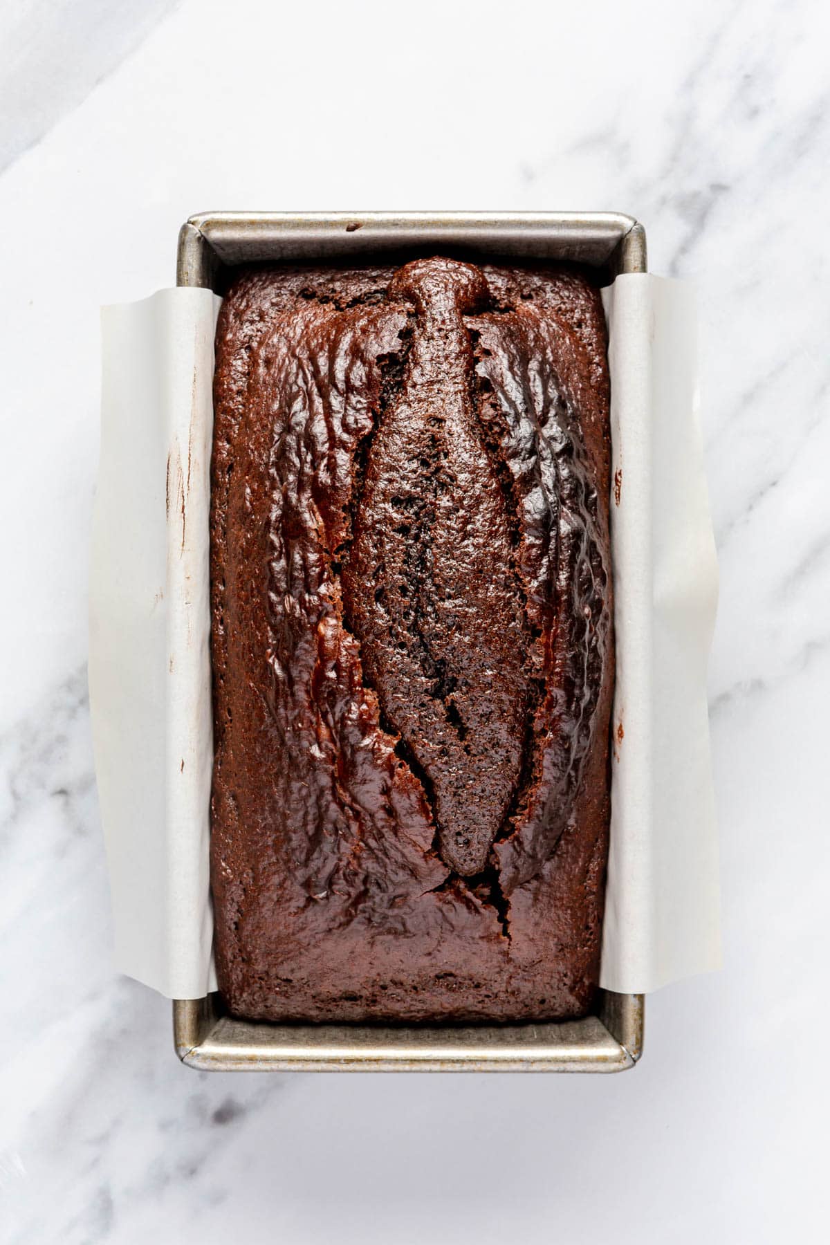 Cake in loaf pan after baking.