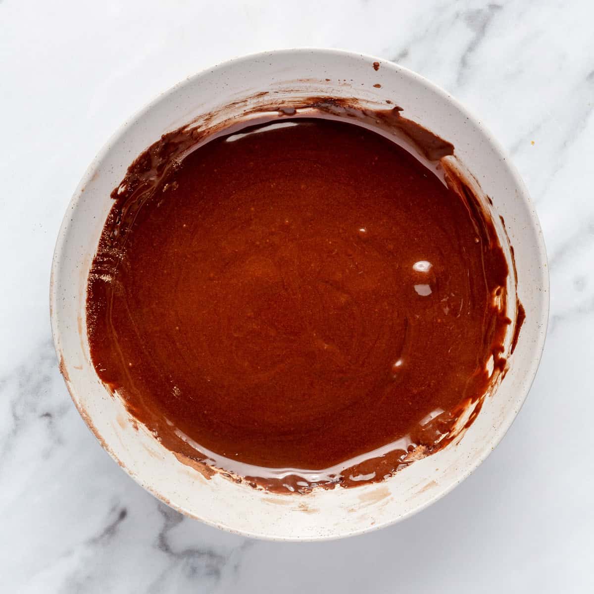 Chocolate glaze in a bowl.