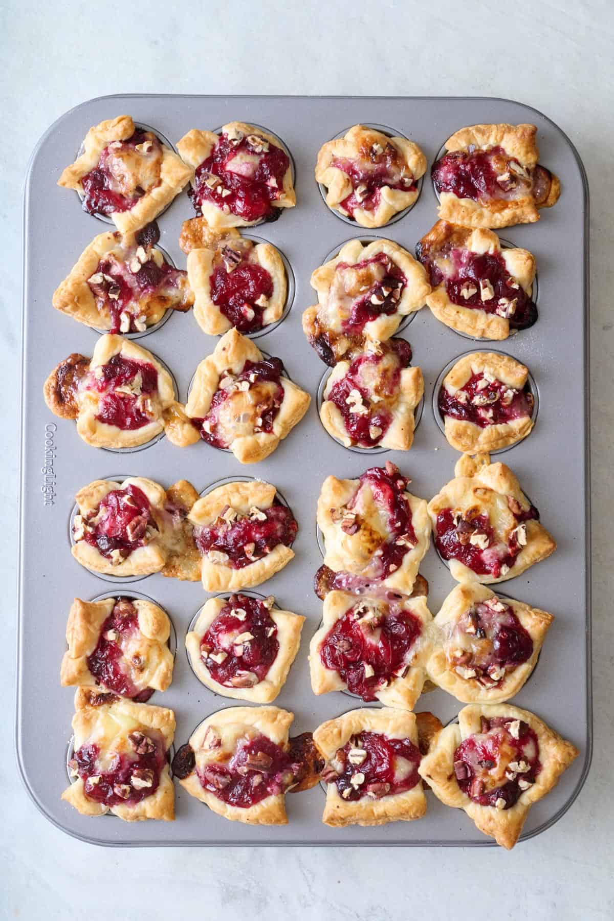 Puff pastry with cheese and cranberries after baking.