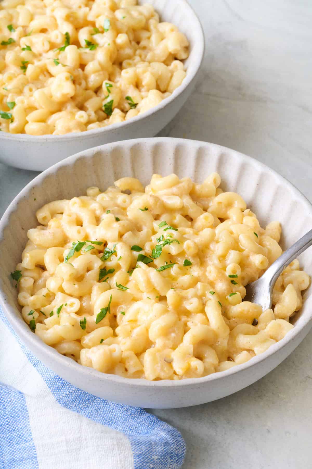 Two bowls of Greek yogurt mac and cheese.