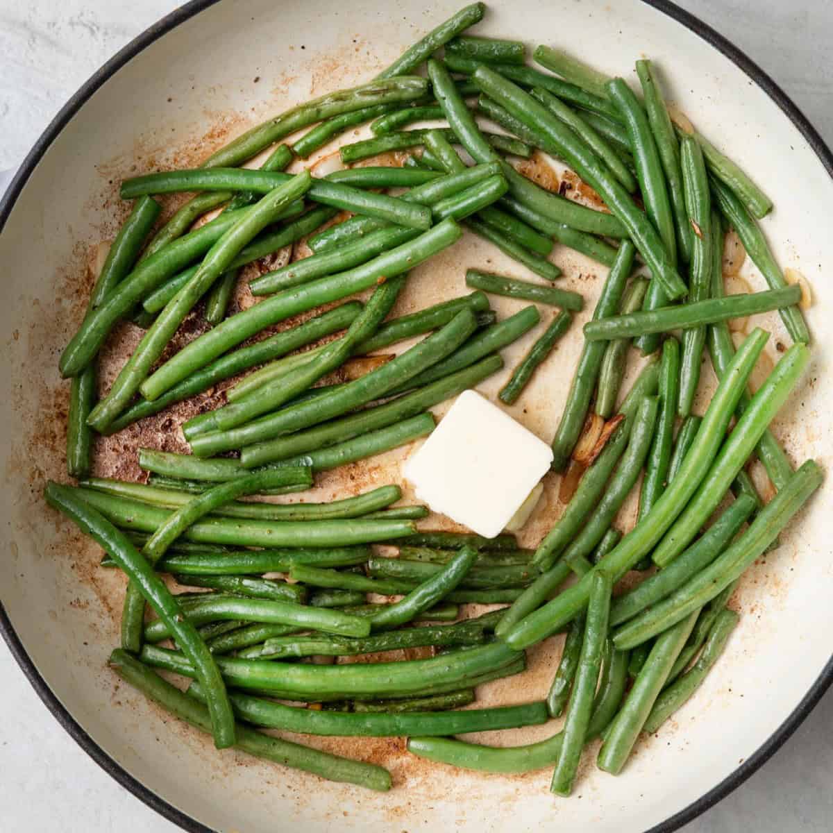 Butter added to pan.