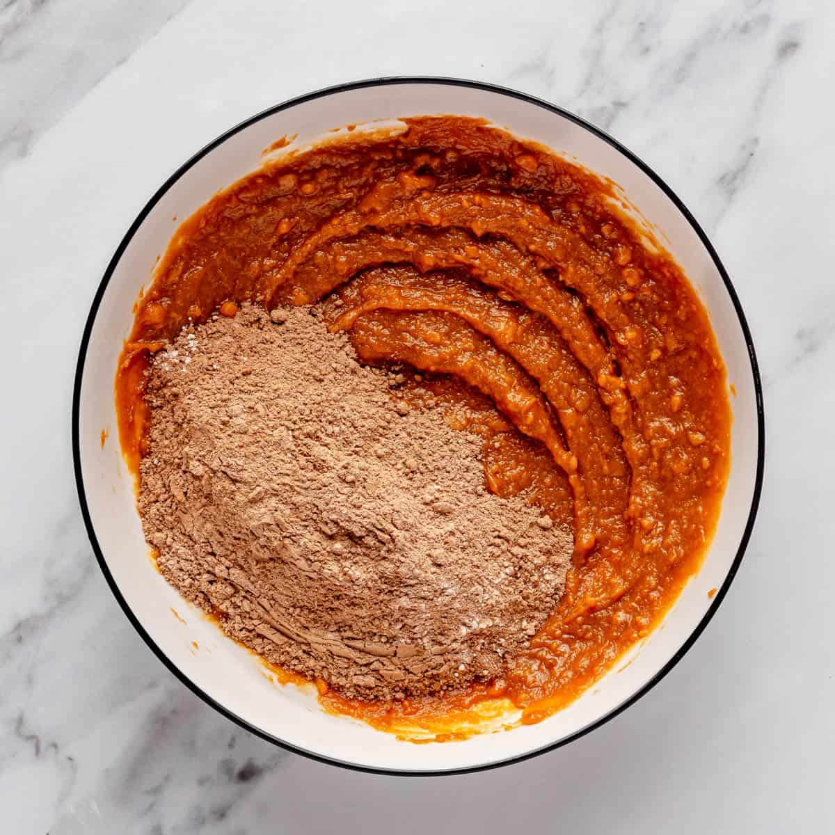 Sweet potato mixture with dry ingredients added.