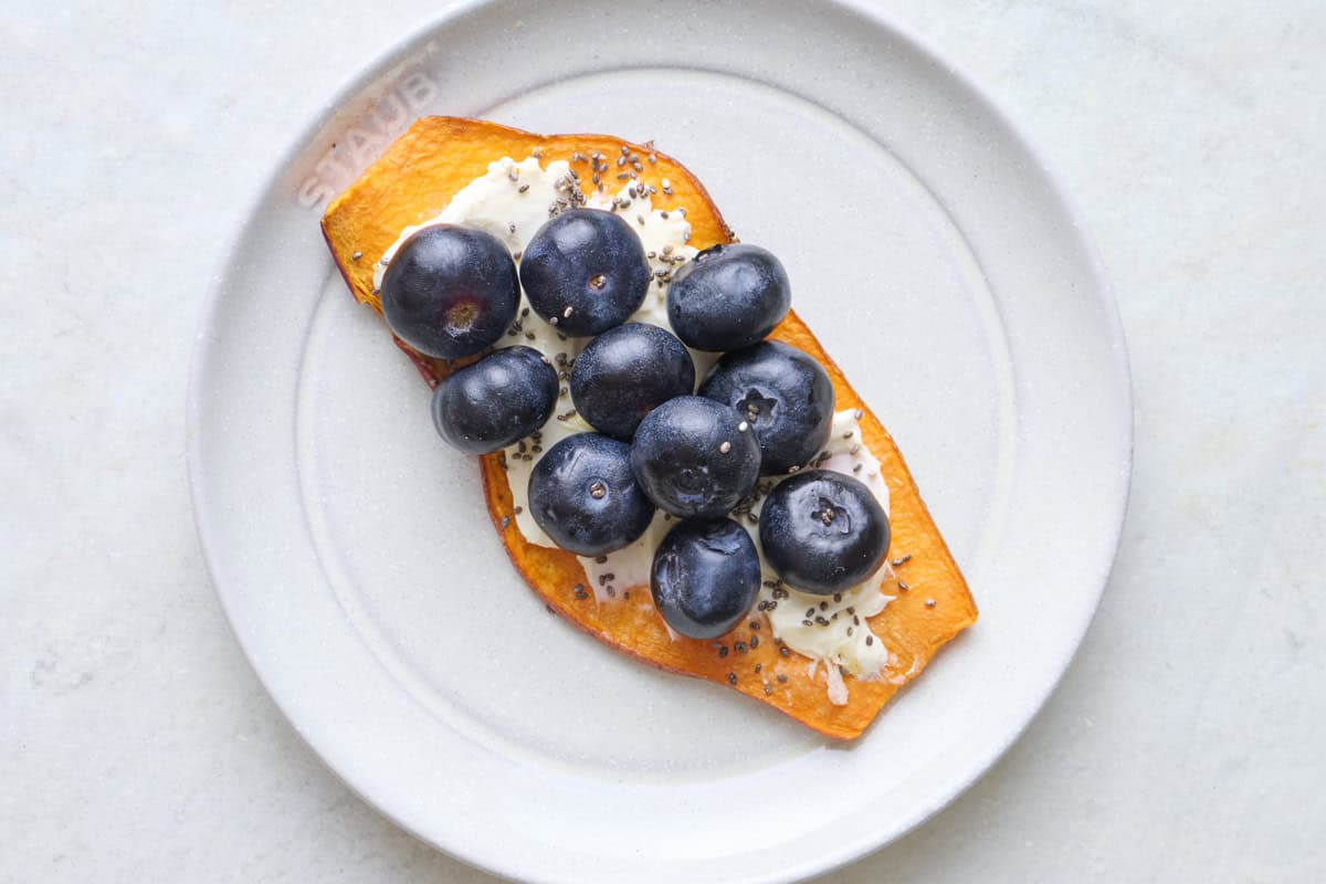 Cream cheese with blueberries and chia seeds sweet potato toast.