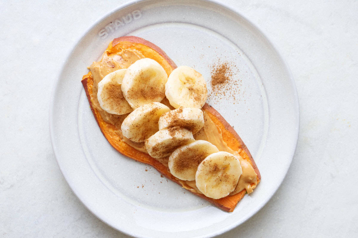 Peanut butter with banana slices and cinnamon sweet potato toast.