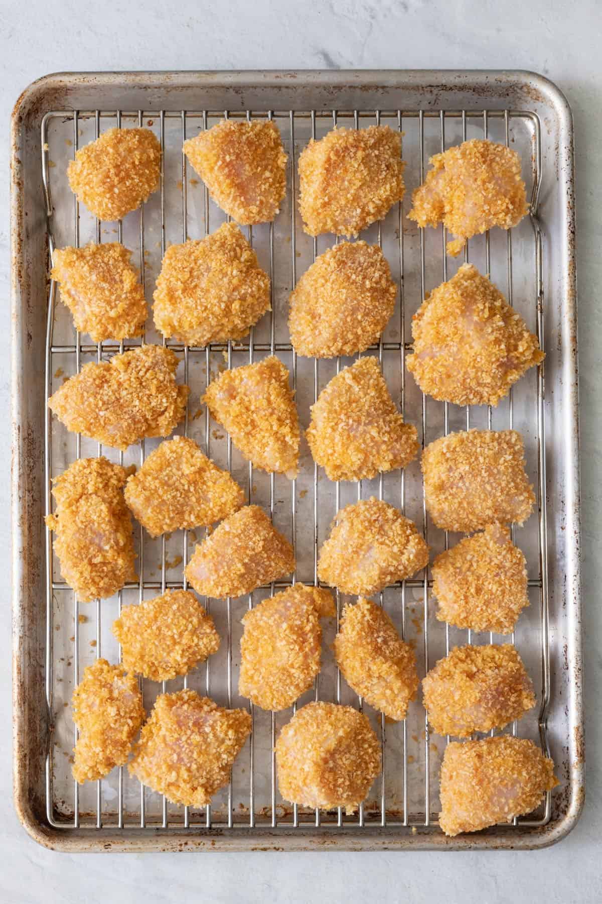 Recipe on a wire rack on top of a sheet pan before baking.