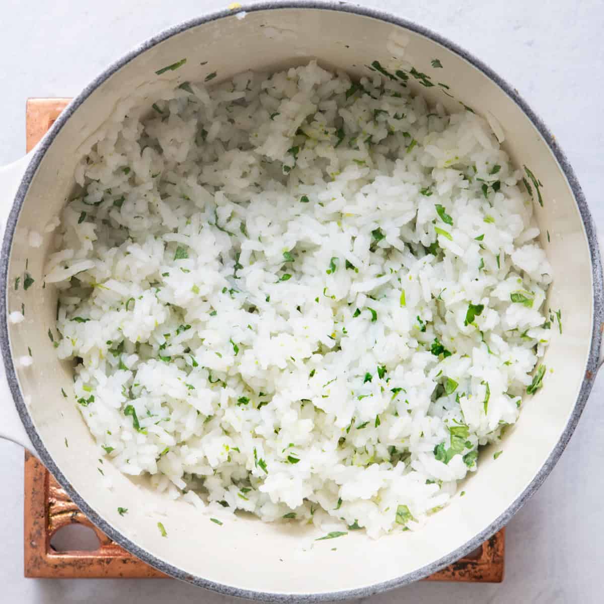 Cilantro lime rice in pot after fluffing.