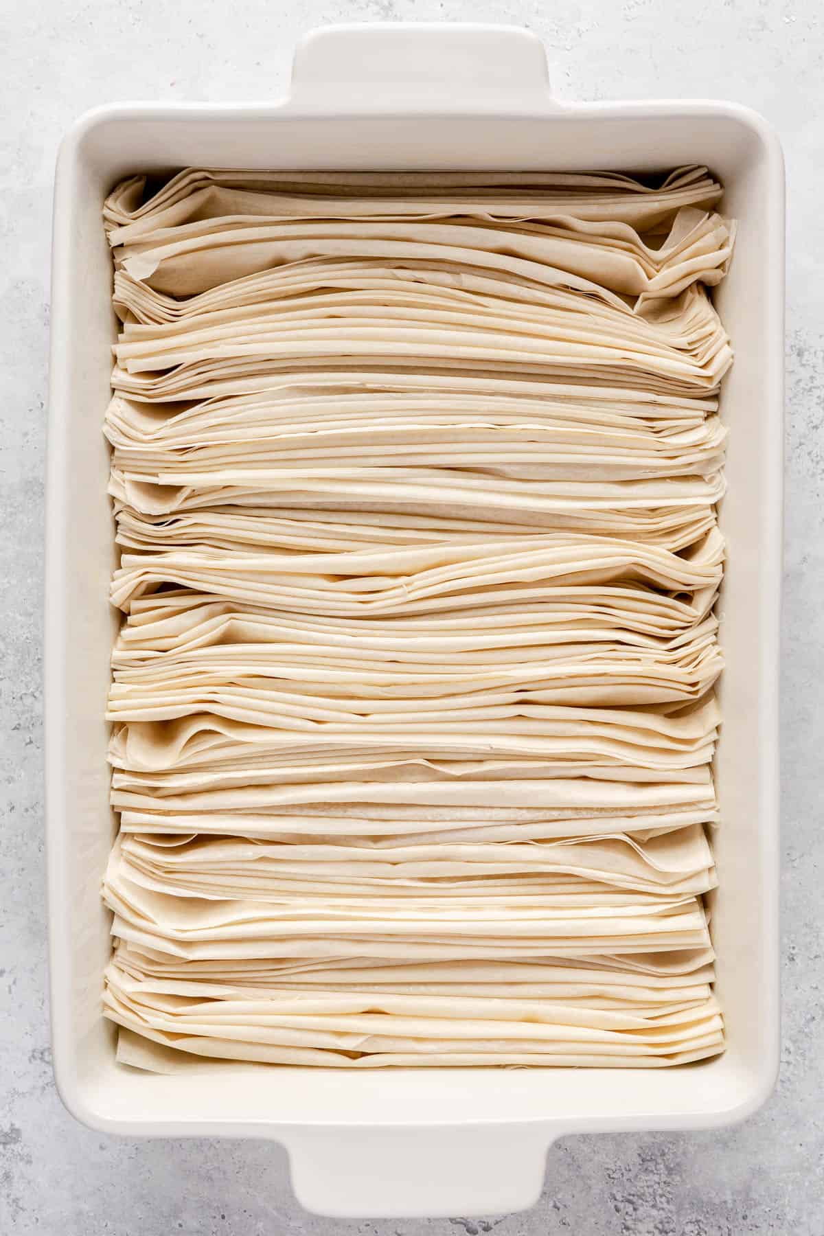 Full baking dish of crinkled phyllo before baking.