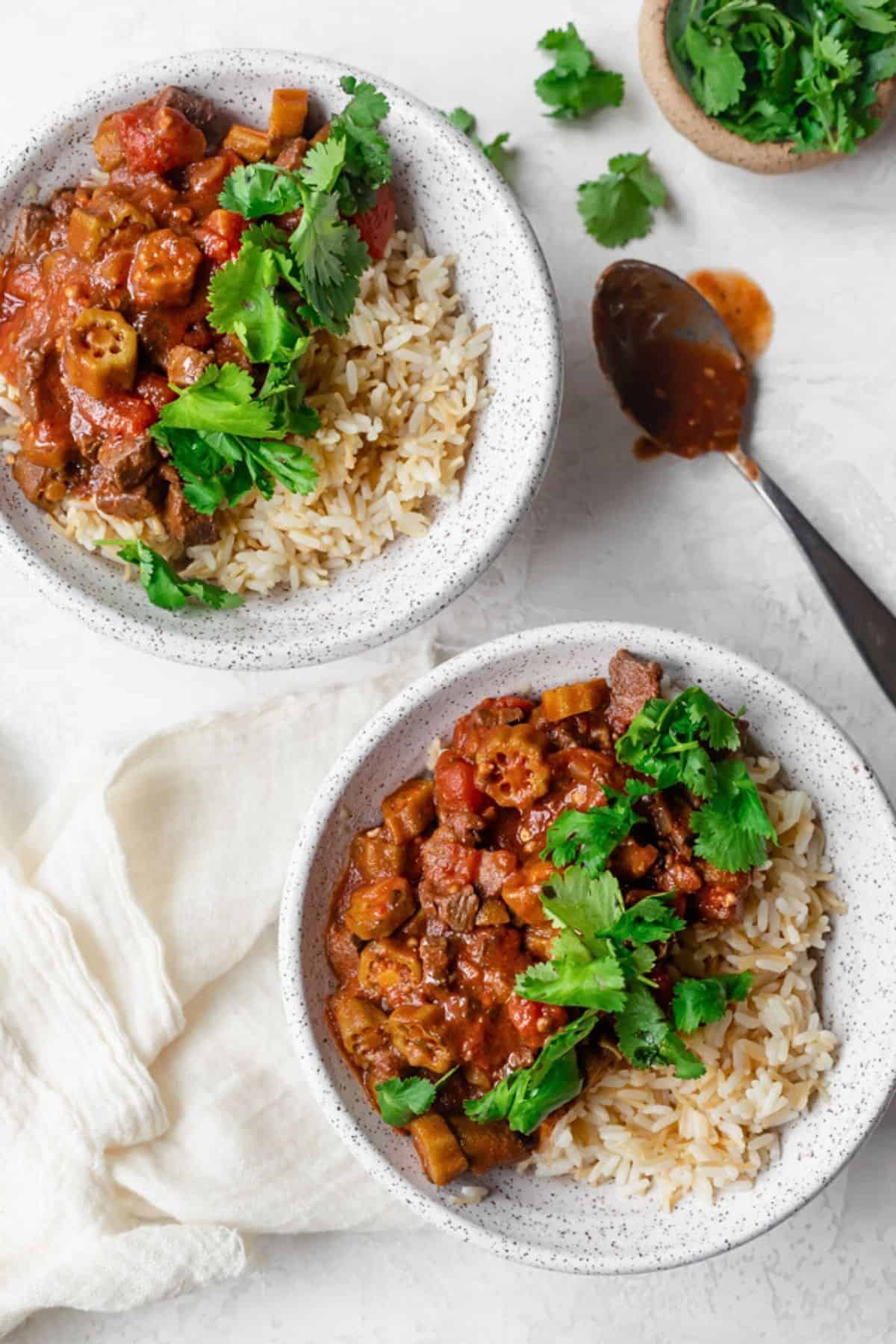 Okra beef stew served over rice.