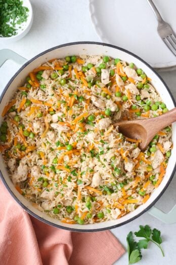 One pot chicken and rice with peas and carrots.