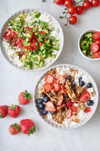 Two cottage cheese bowls, one with savory toppings including chopped veggies, herbs, salt and pepper. The other bowl with sweet toppings including fresh fruit, granola, and peanut butter.