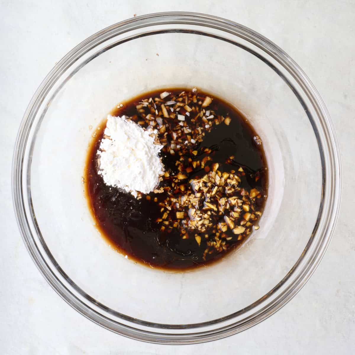 Sauce ingredients in a bowl before mixing.