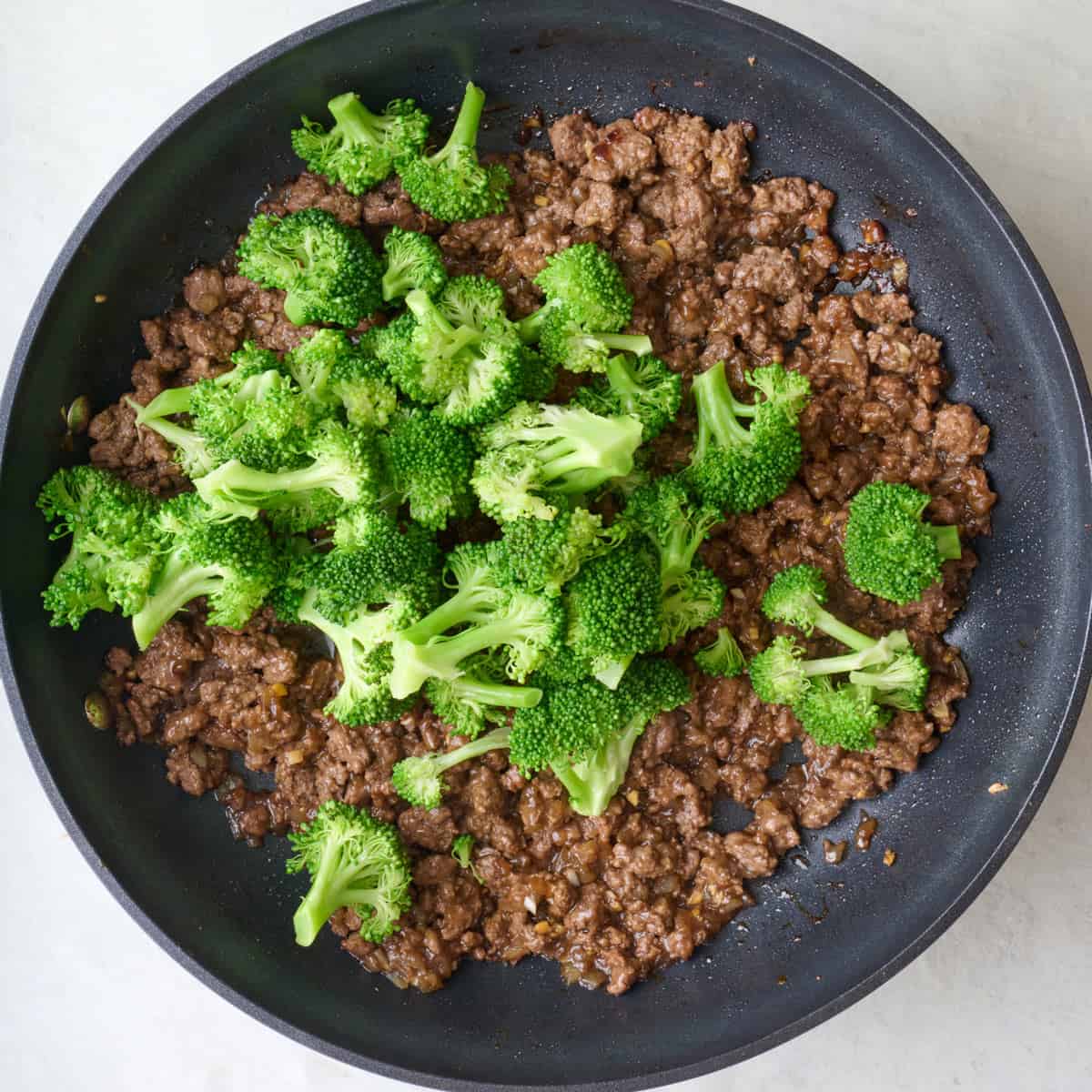 After sauce has thickened with cooked broccoli added.