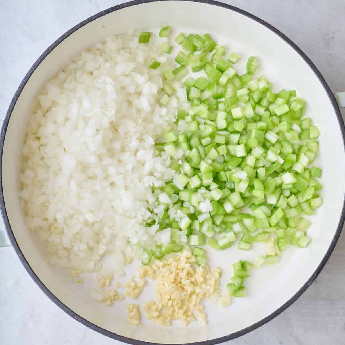 Aromatics in pot before cooking.