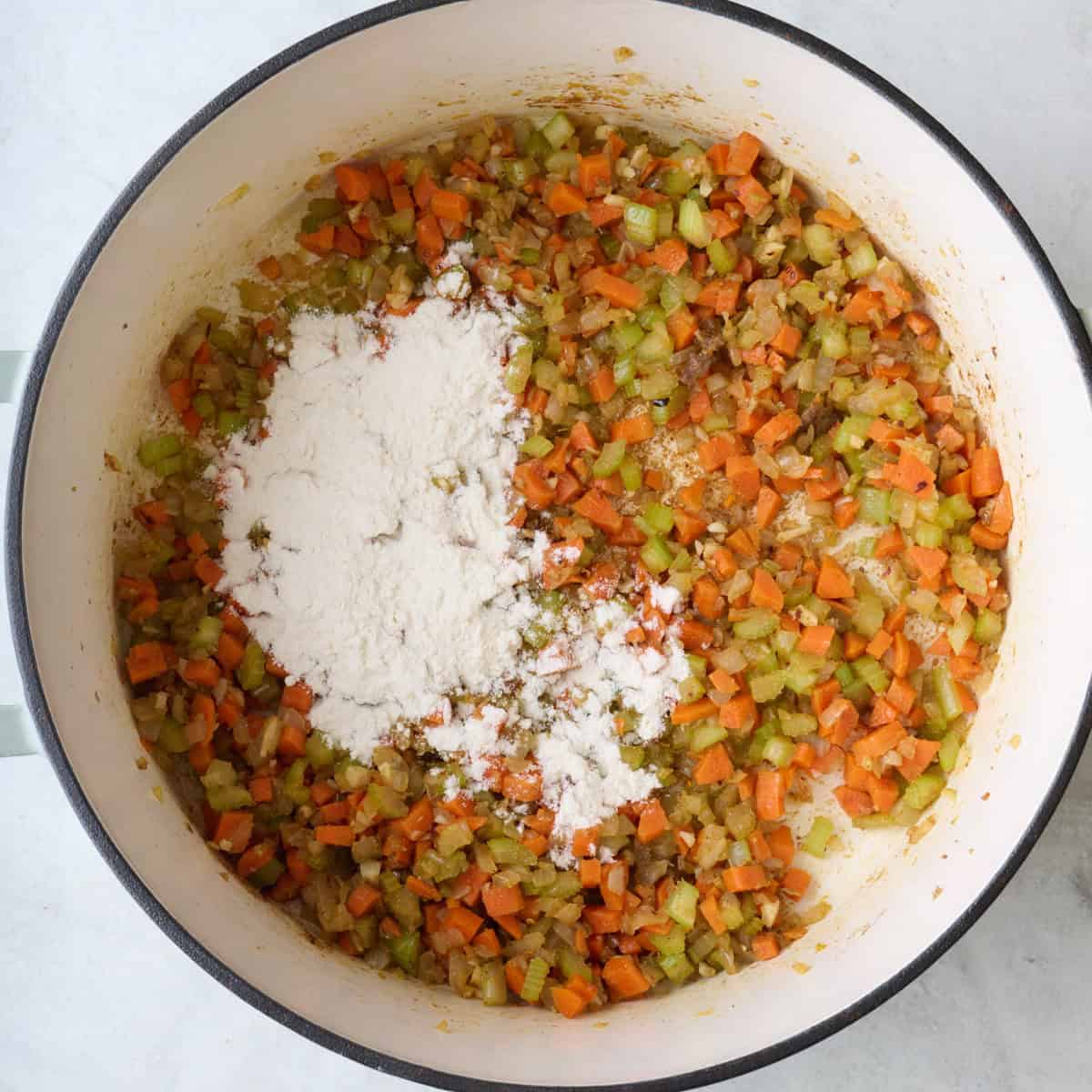 Flour added to cooked veggies.