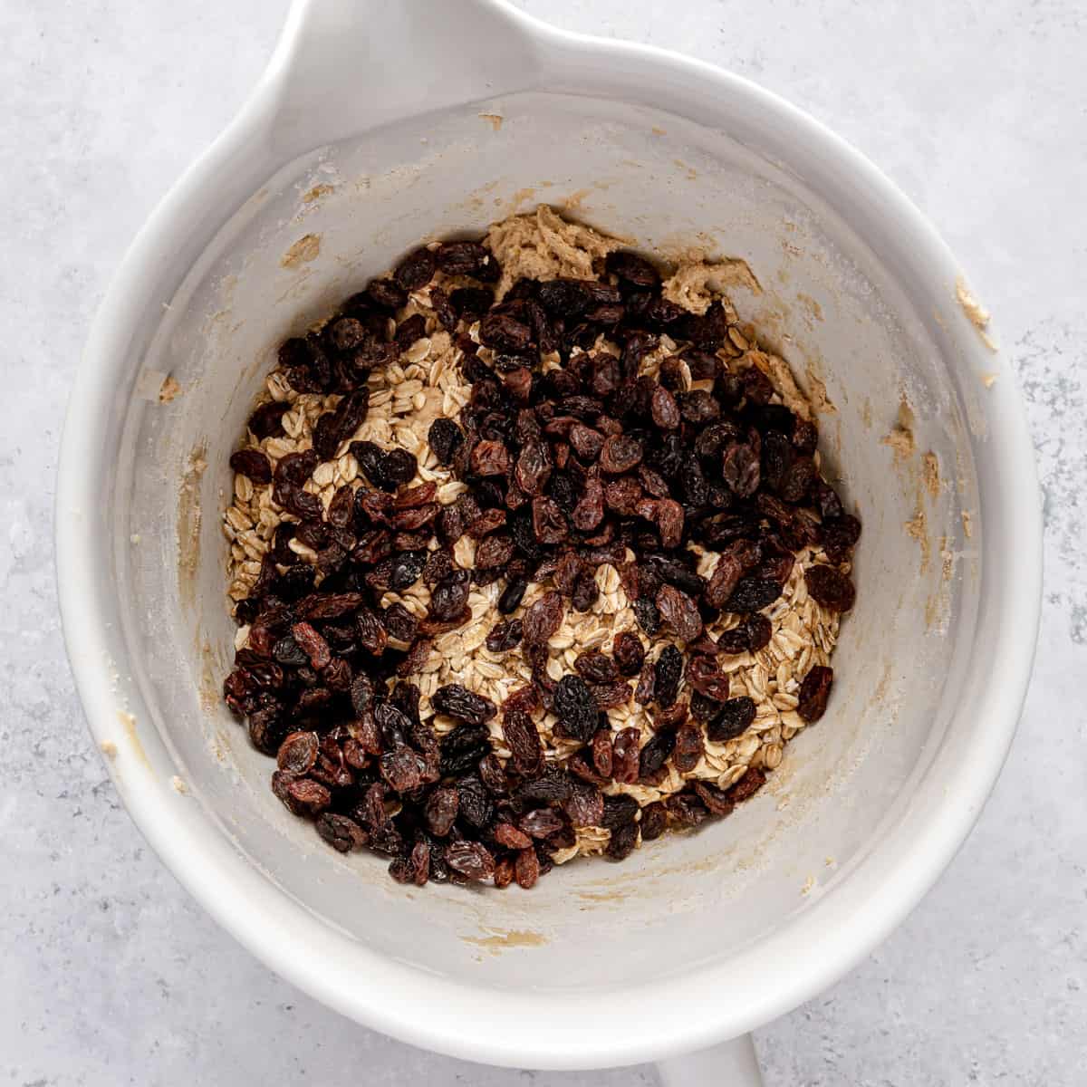 After flour is combined with oats and raisins added.