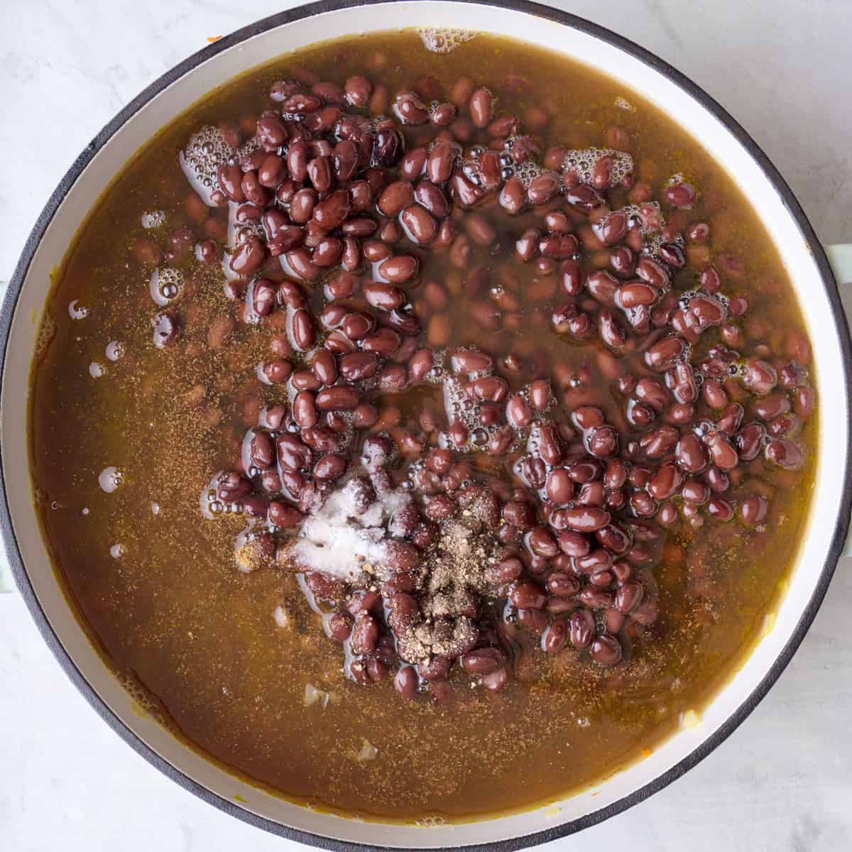 After cooking garlic with black bean, broth, and seasonings added.