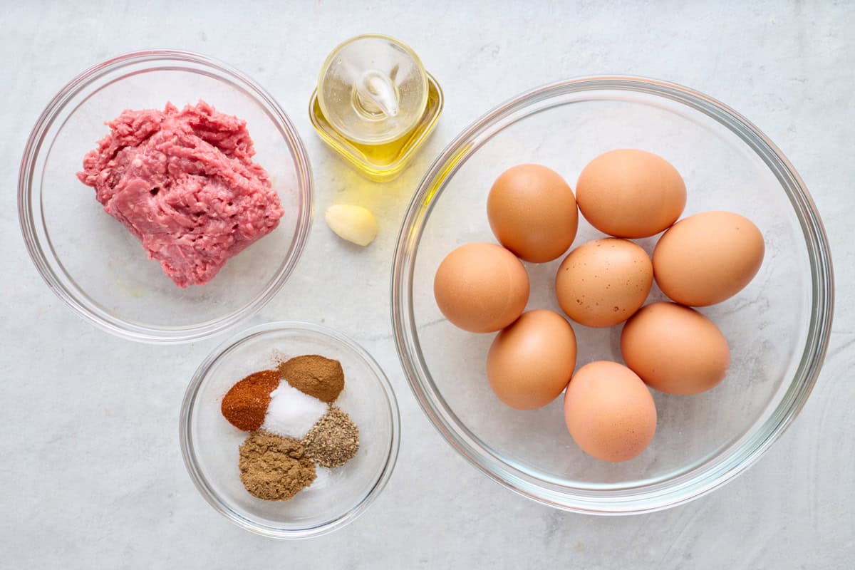 Ingredients for recipe: ground beef, eggs, garlic, oil and spices.