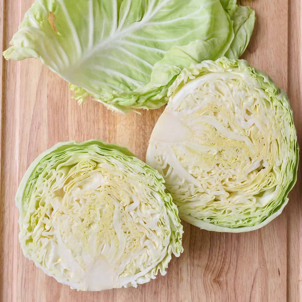 Head of cabbage cut in half.