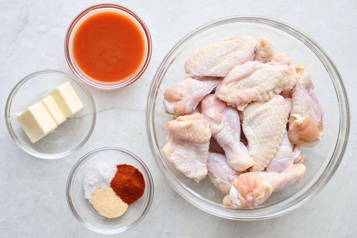 Ingredients for recipe: butter, garlic powder, smoked paprika, salt, and chicken wings.