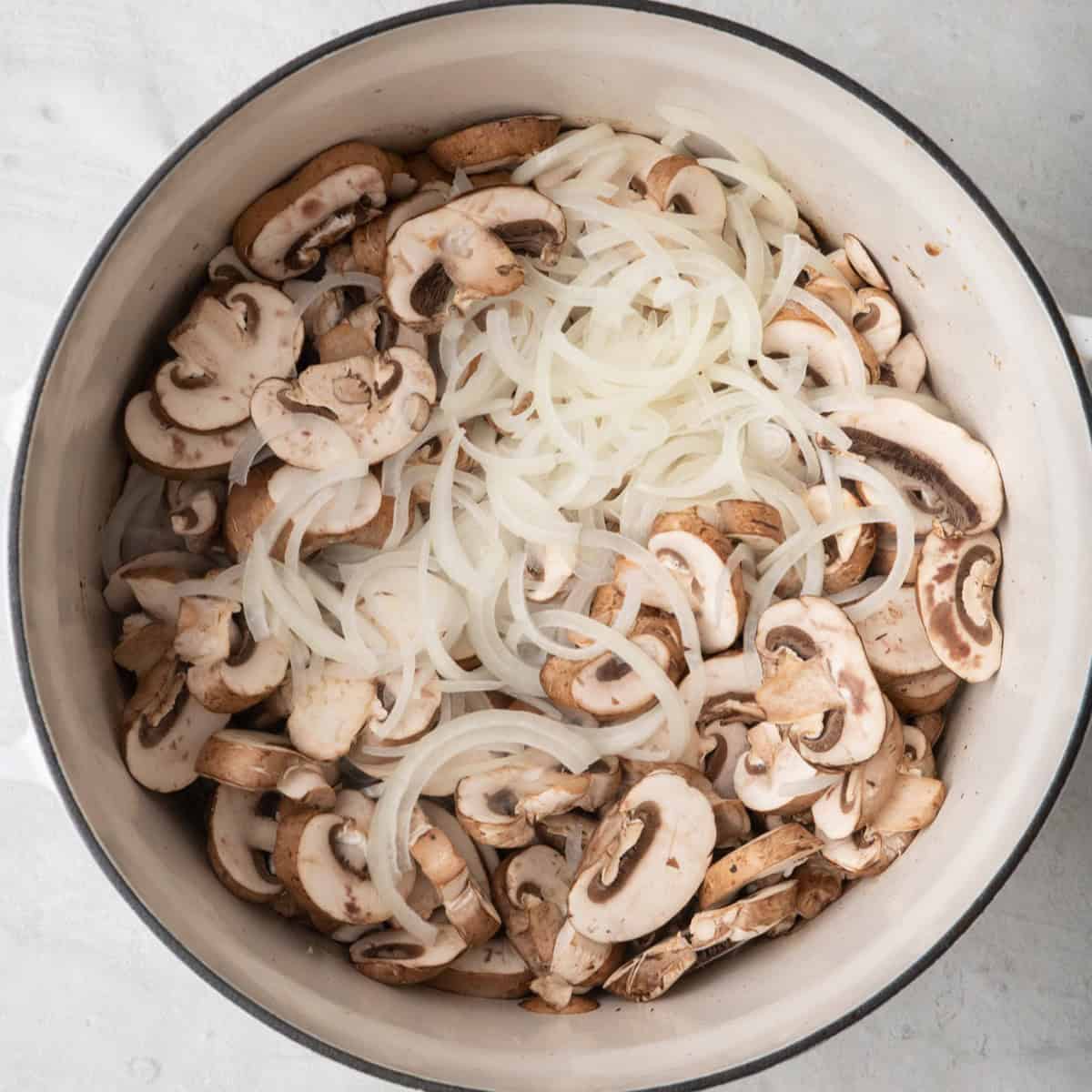 Beef removed from pan and mushrooms and onions added before cooked.