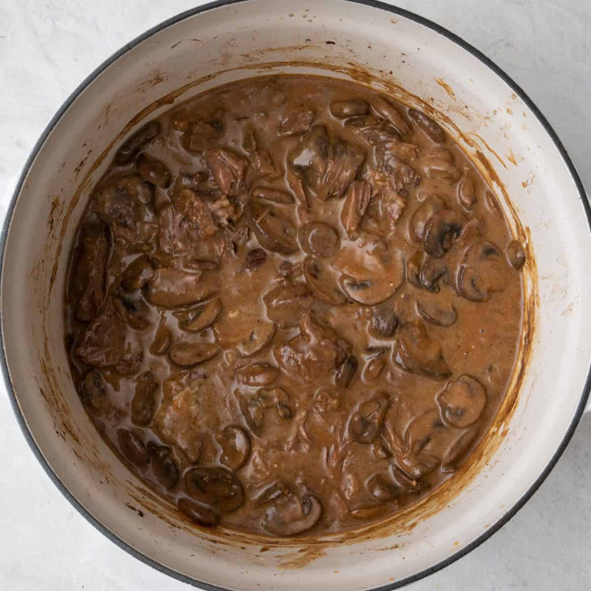 Beef stroganoff after combined to show creamy meaty gravy.