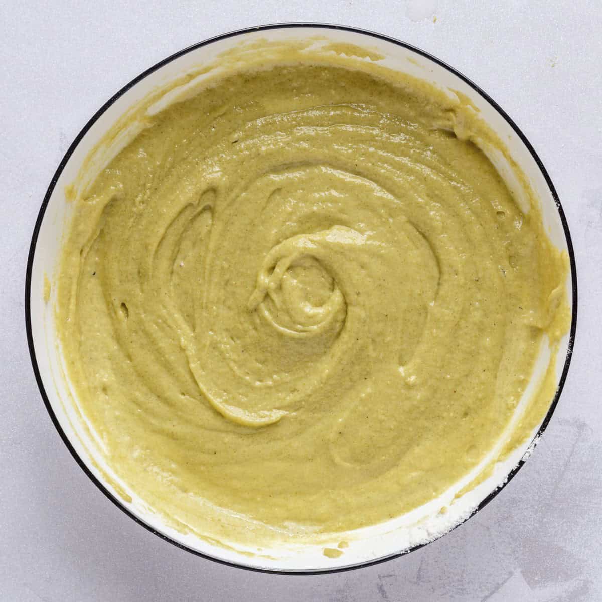 Cake batter after mixing in a bowl.