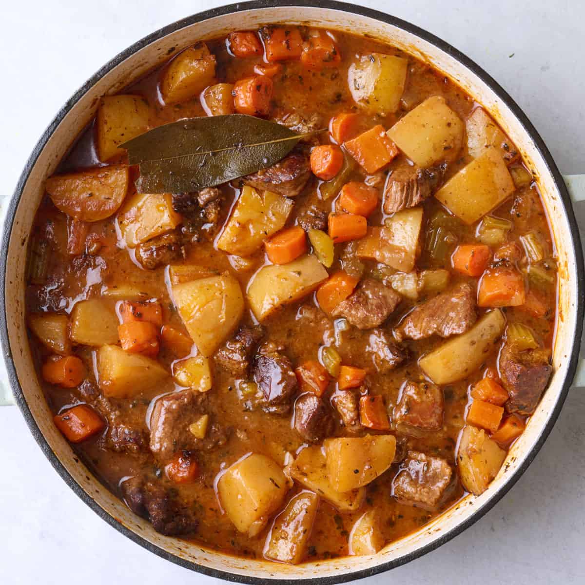 Recipe after simmering to show thickened sauce and tender vegetables.