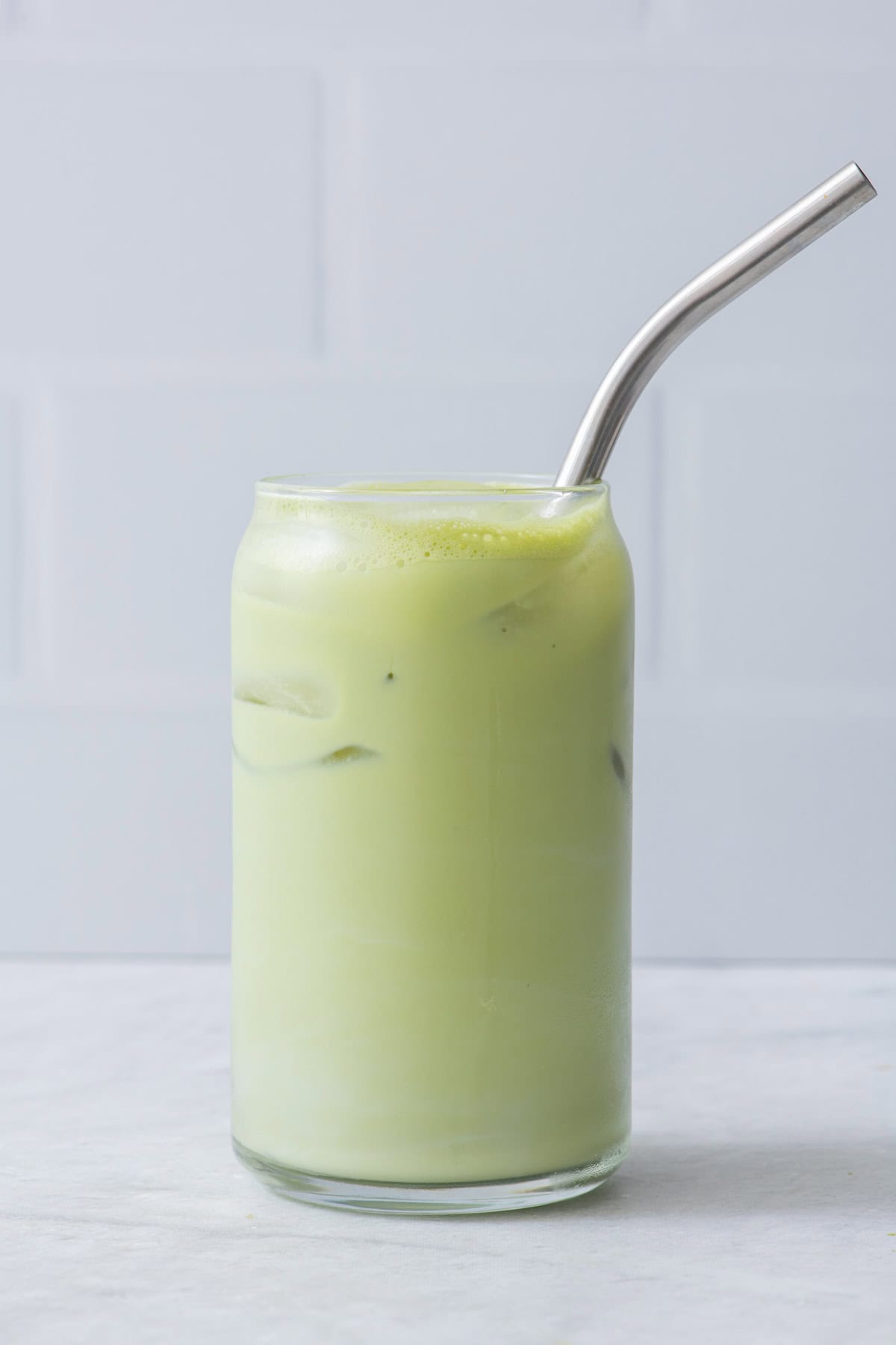 Recipe in a glass with straw.