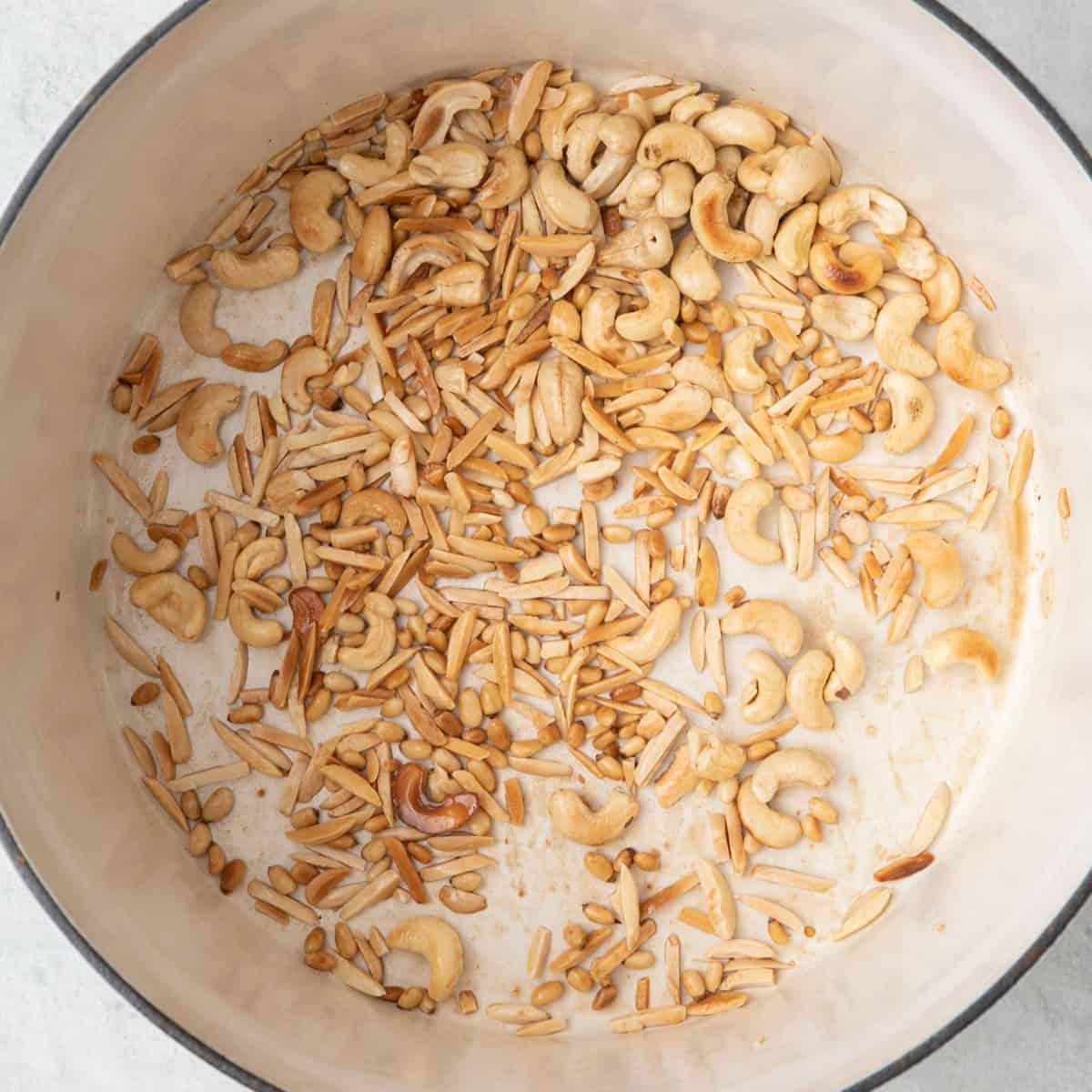 After toasting still in the pot.