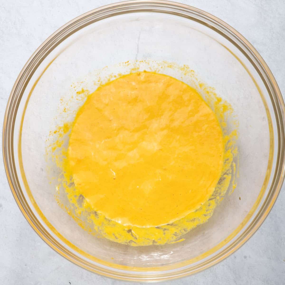 Large bowl of greek yogurt, egg, turmeric and half the saffron water.