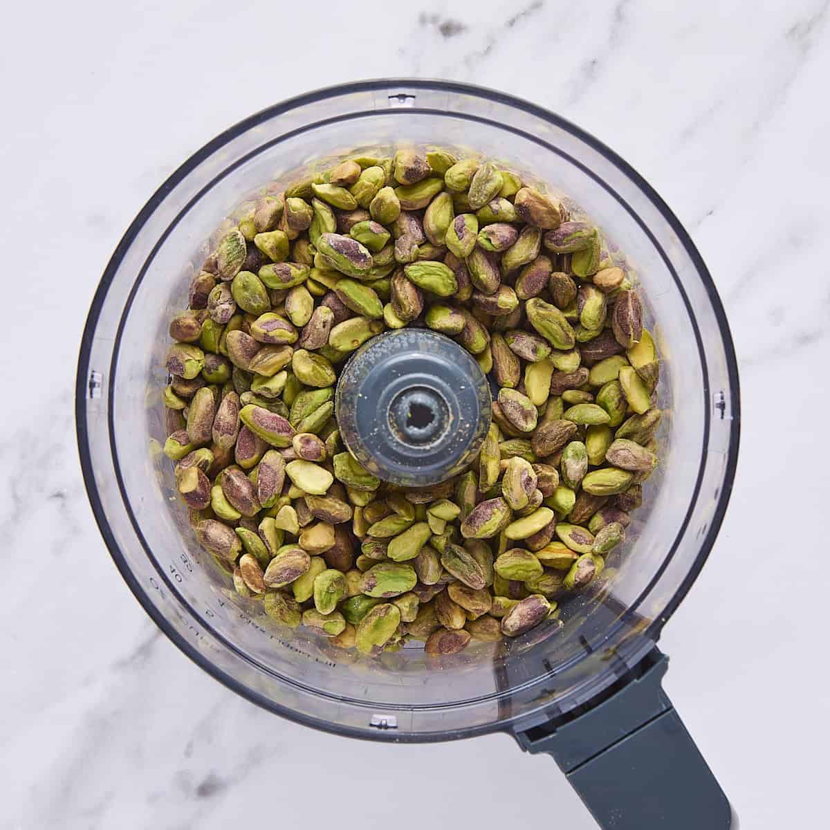 Pistachios in a food processor.