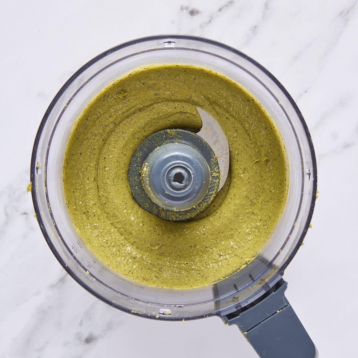 After pistachios are blended into a thick paste in the food processor.