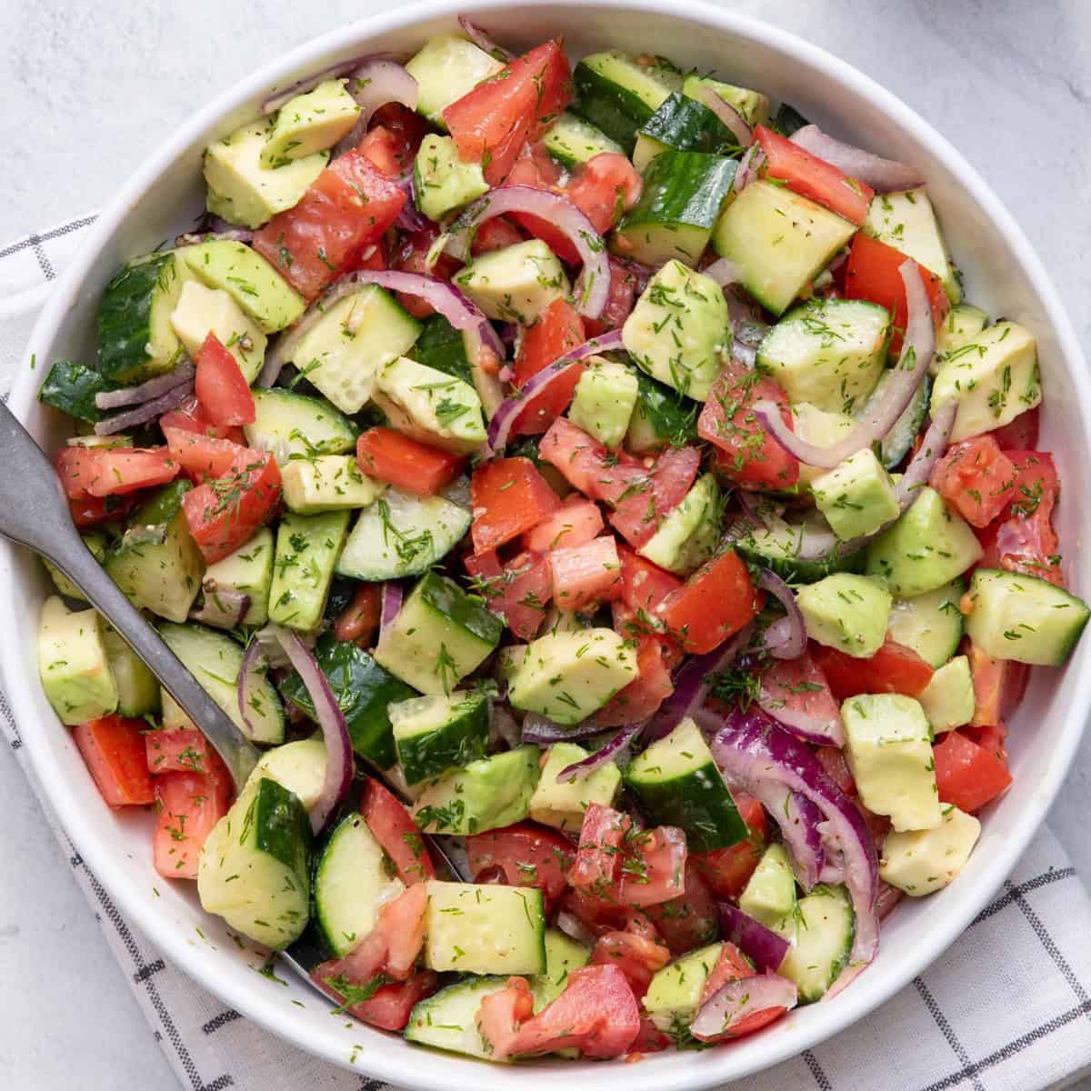 Tomato cucumber avocado salad recipe.