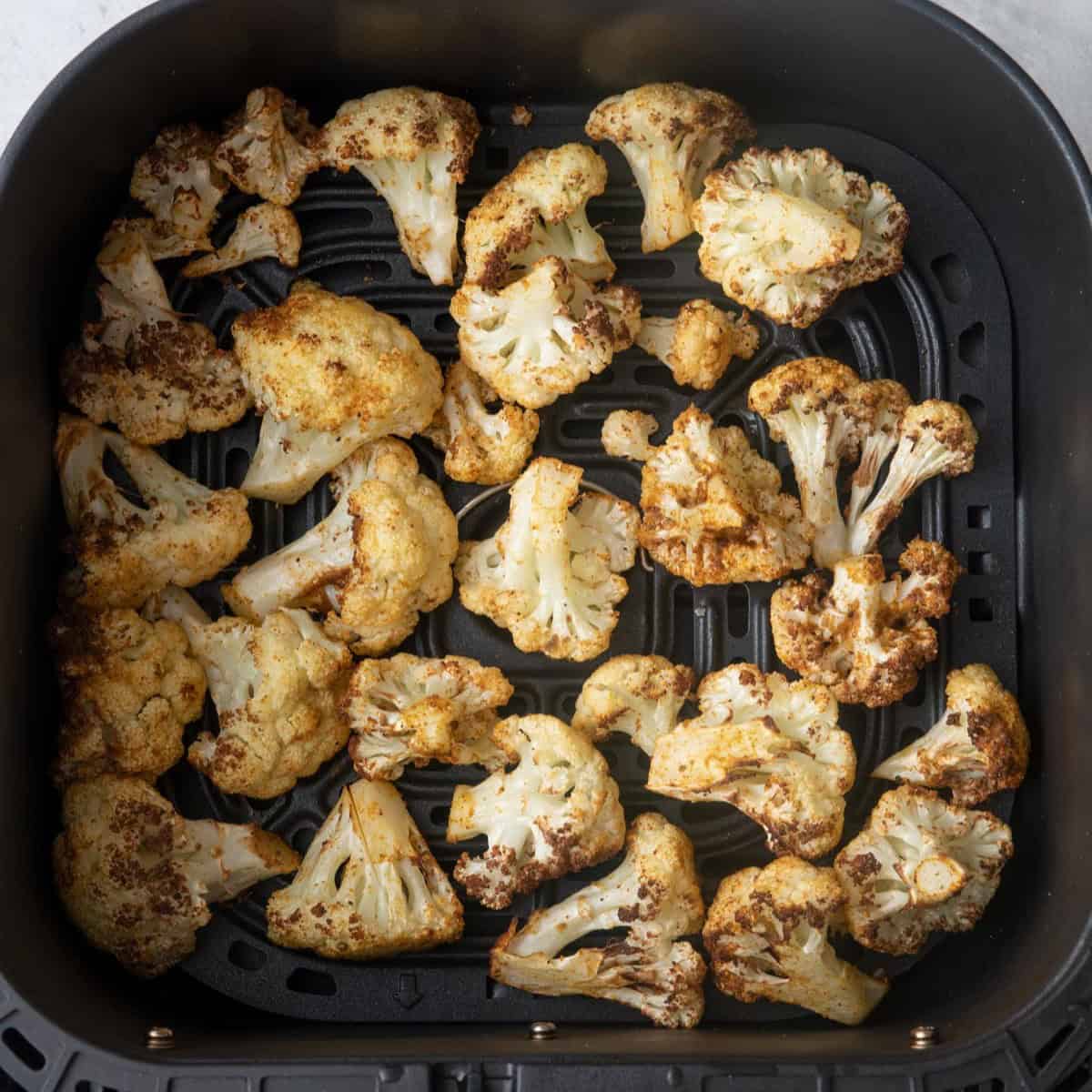 Recipe halfway through cooking looks tossed to signify shaken.