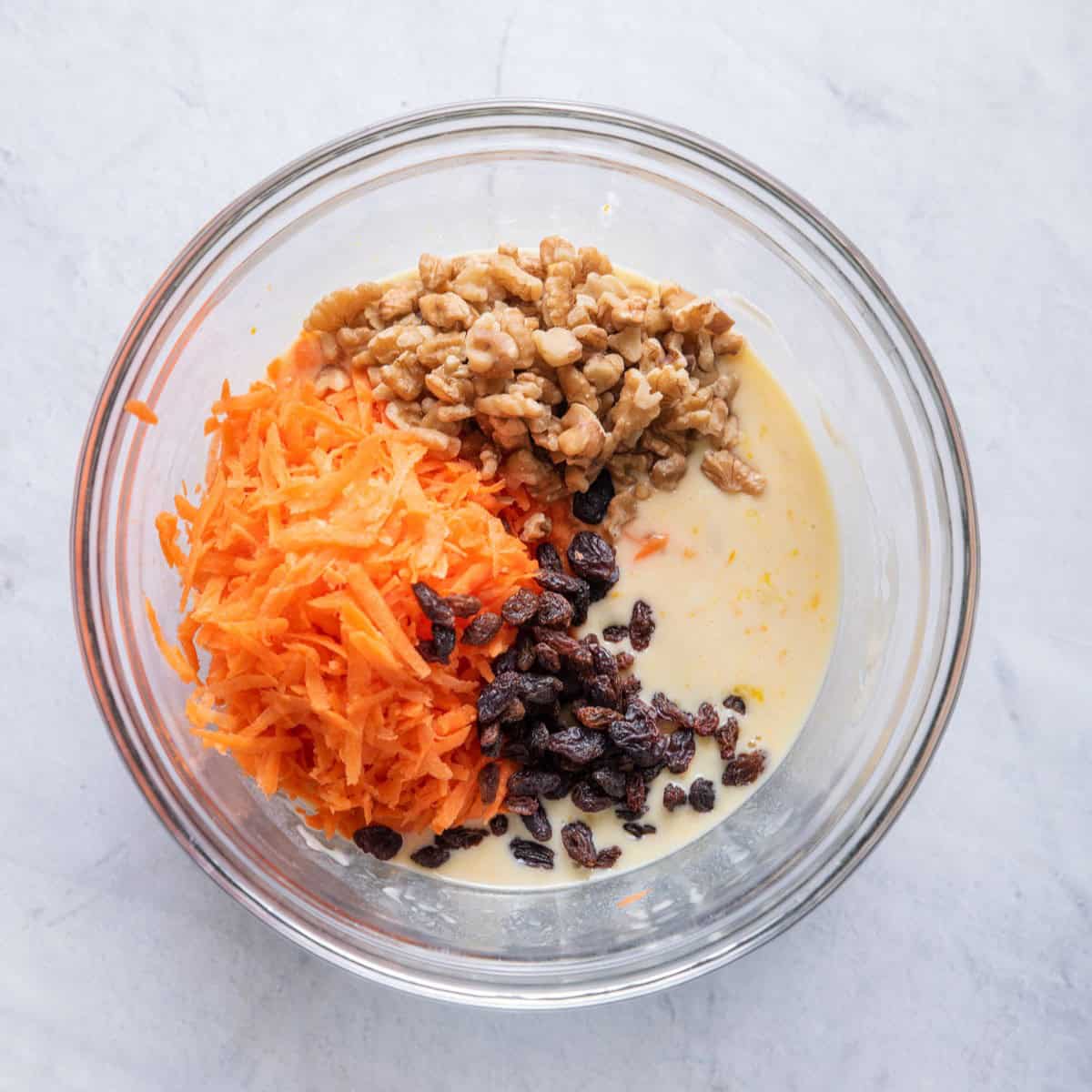Shredded carrots, raisins, and walnuts added.