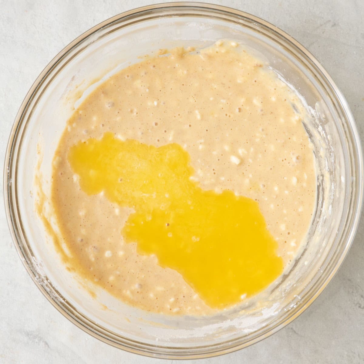 After wet and dry are combined with melted butter added.